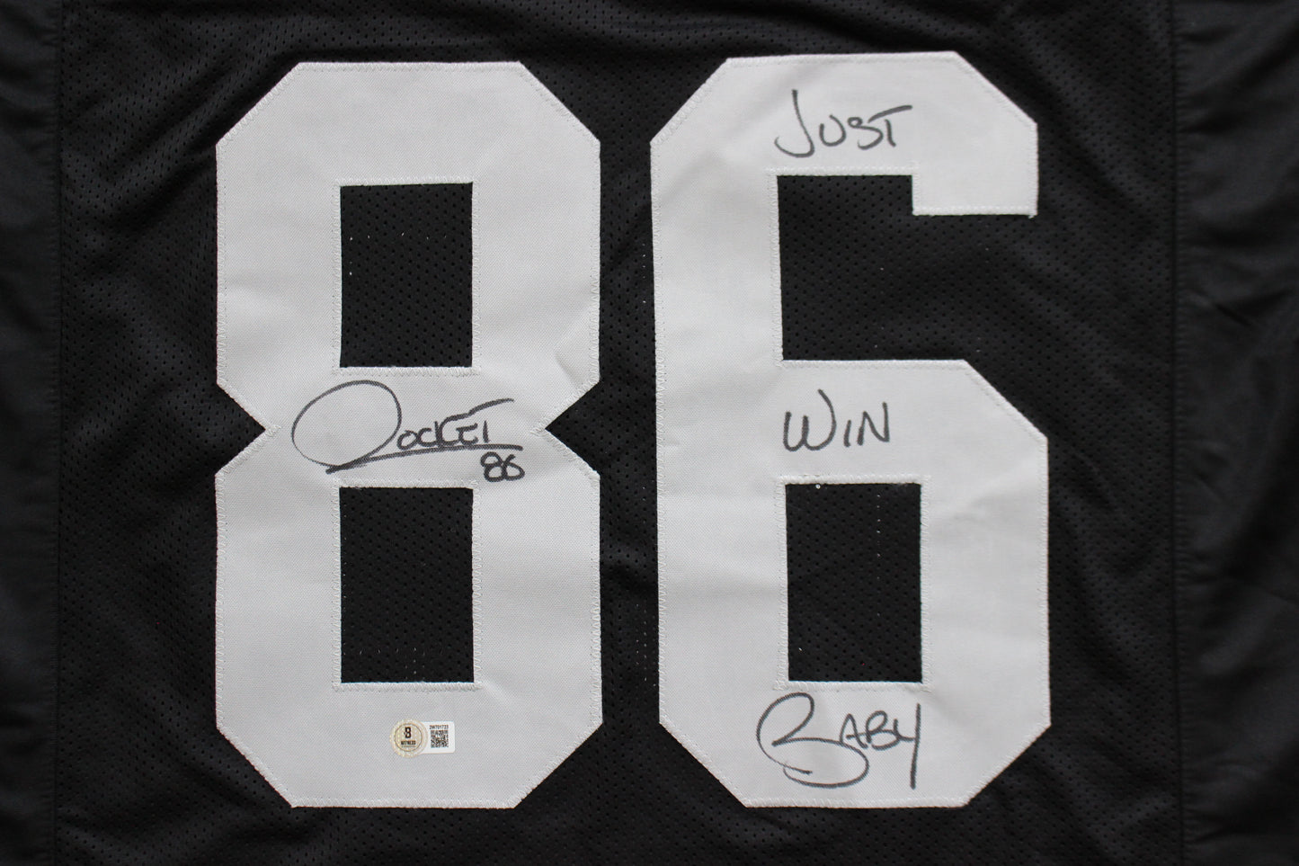 ROCKET ISMAIL RAIDERS SIGNED BLACK JERSEY w/JUST WIN BABY BAS COA