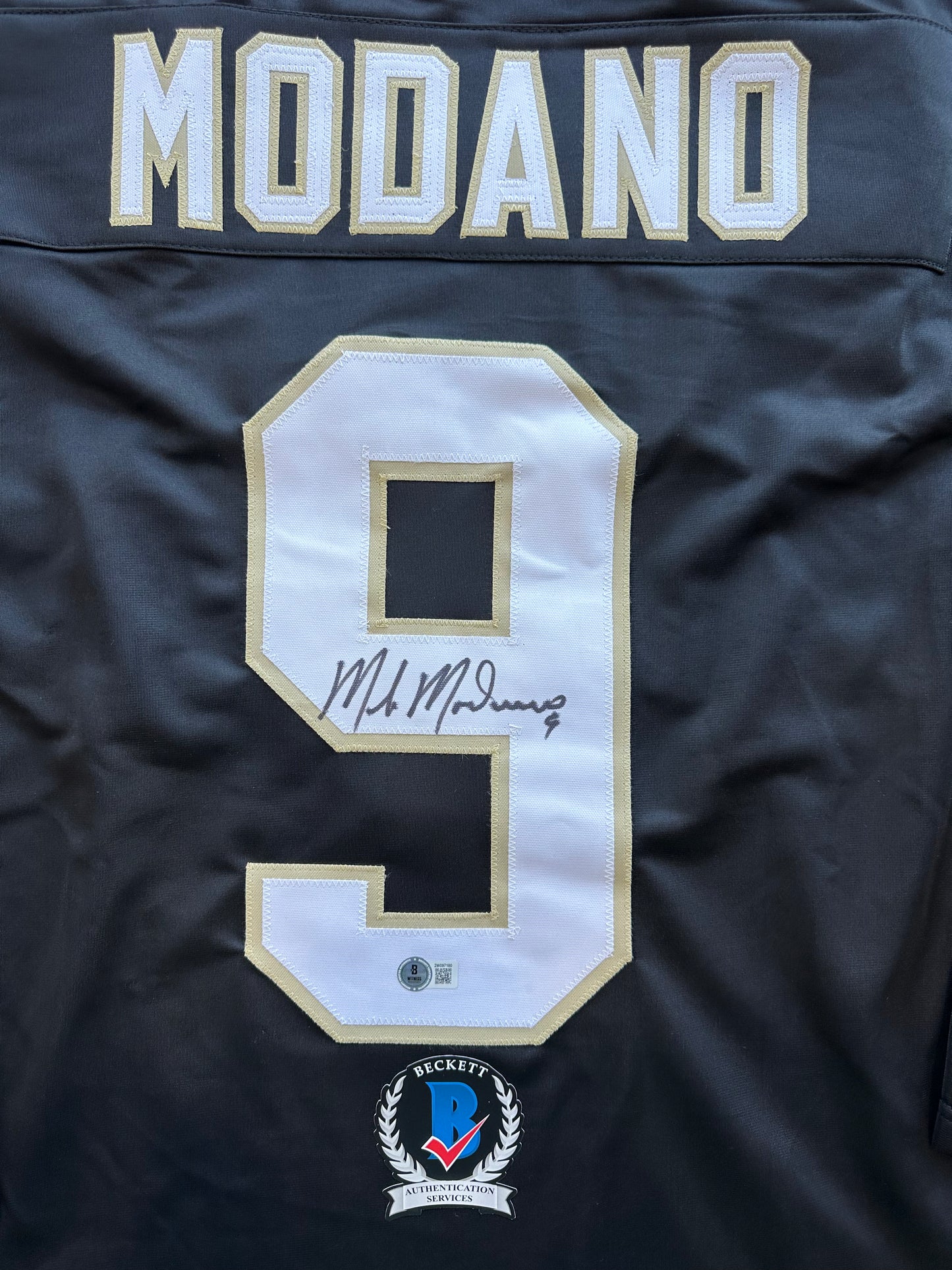 MIKE MODANO SIGNED BLACK AND GOLD HOCKEY JERSEY XL Dallas Stars BAS