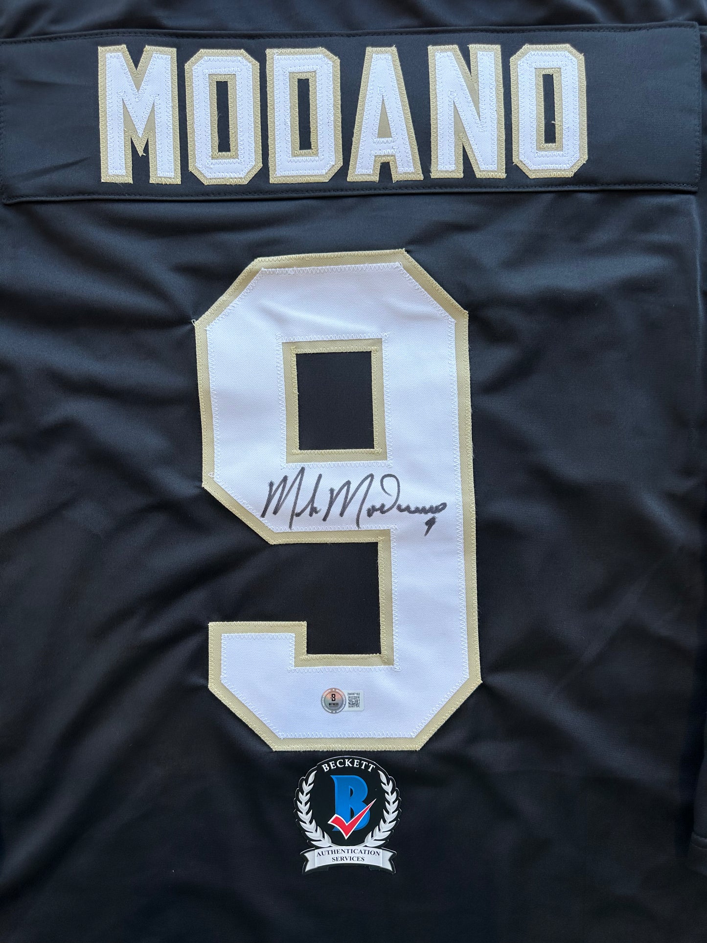 MIKE MODANO SIGNED BLACK AND GOLD HOCKEY JERSEY XL Dallas Stars BAS