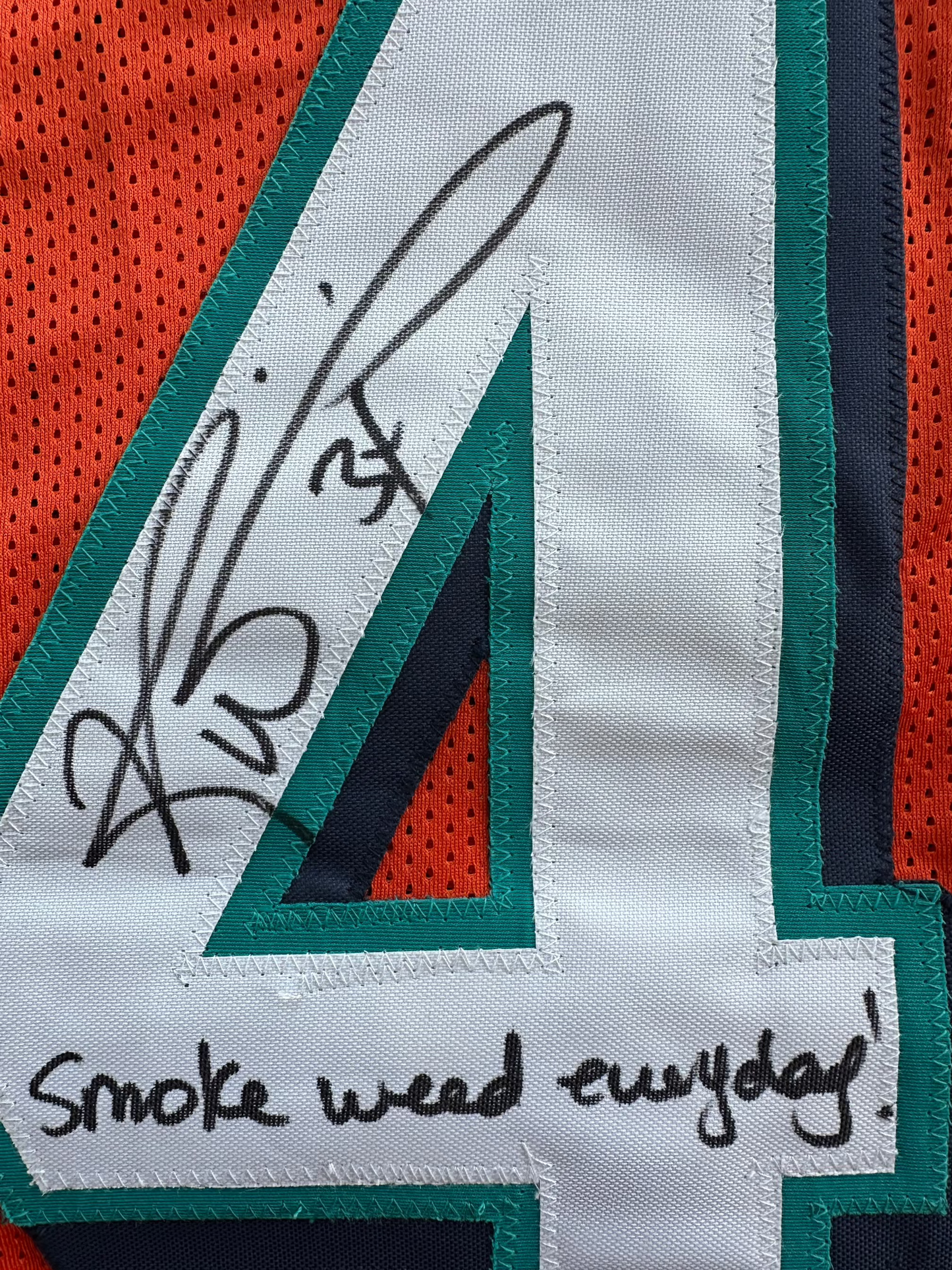 RICKY WILLIAMS ORANGE FOOTBALL JERSEY Miami Dolphins w/"Smoke Weed Everyday" BAS