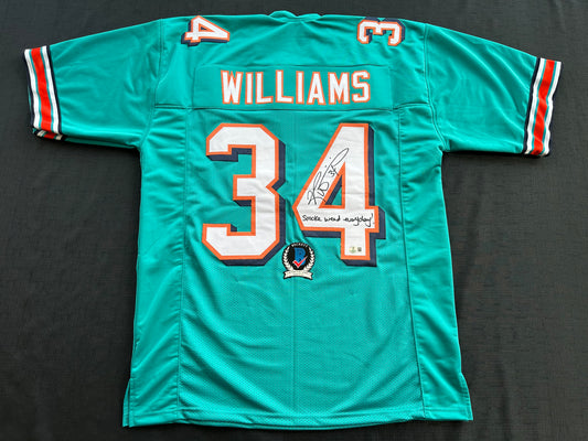 RICKY WILLIAMS SIGNED TEAL FOOTBALL JERSEY Miami Dolphins w/"Smoke Weed Everyday" BAS
