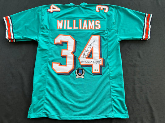 RICKY WILLIAMS SIGNED TEAL FOOTBALL JERSEY Miami Dolphins w/"Smoke Weed Everyday" BAS