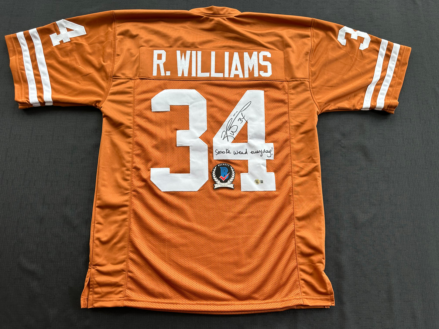 RICKY WILLIAMS SIGNED ORANGE FOOTBALL JERSEY Longhorns w/"Smoke Weed Everyday" BAS