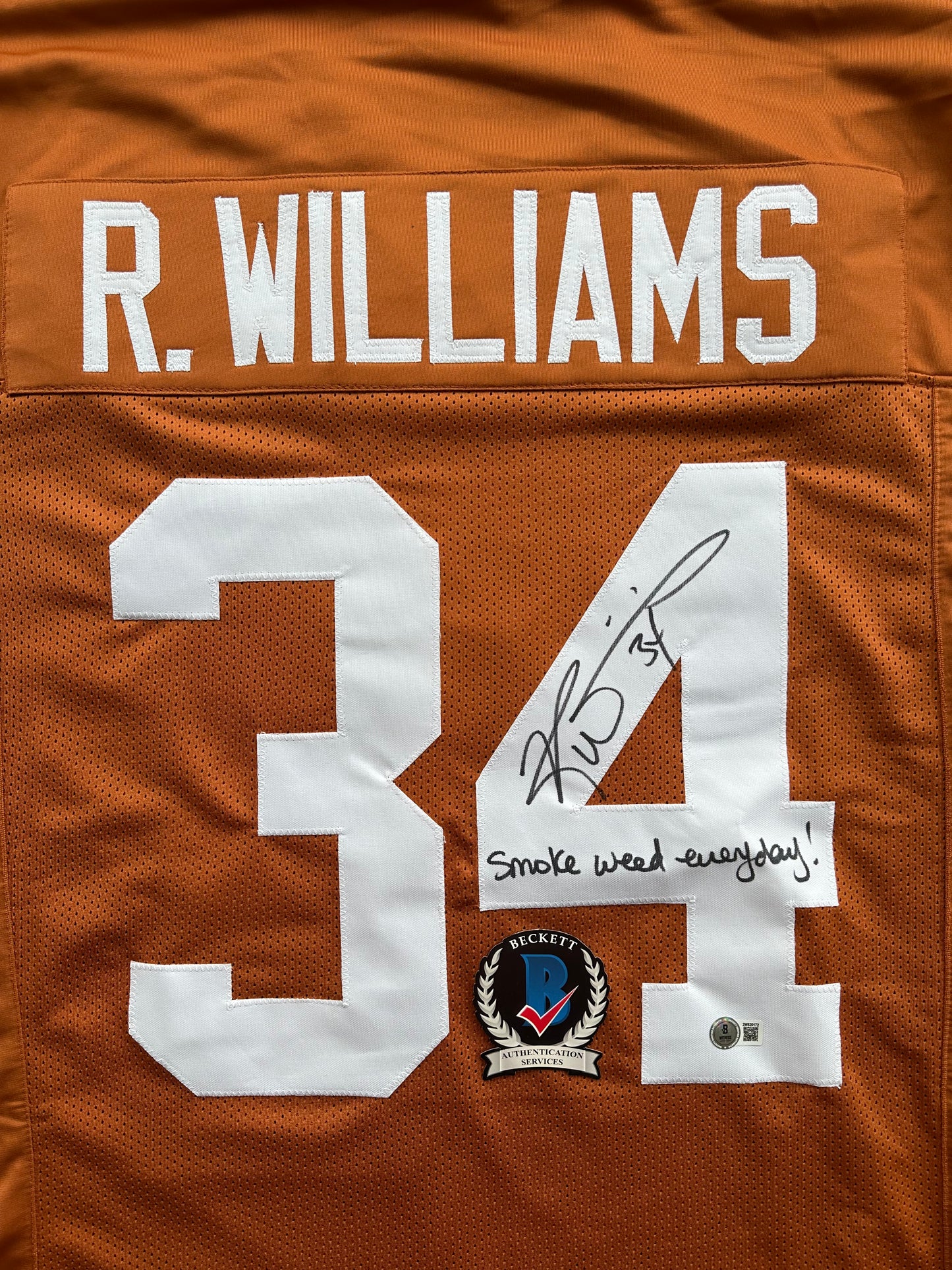RICKY WILLIAMS SIGNED ORANGE FOOTBALL JERSEY Longhorns w/"Smoke Weed Everyday" BAS