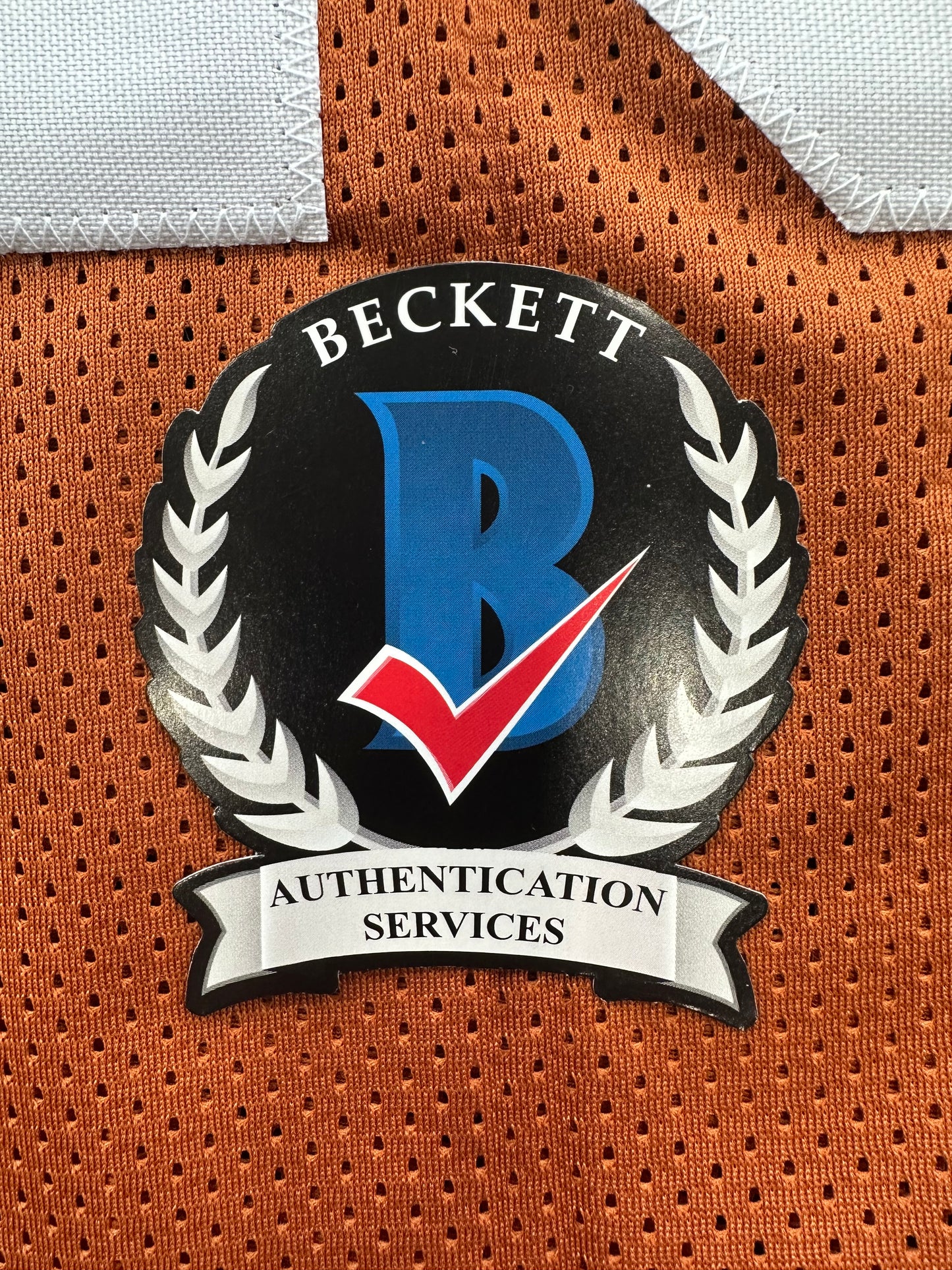 EARL CAMPBELL SIGNED ORANGE FOOTBALL JERSEY Texas Longhorns Large BAS COA